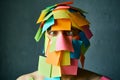 Close up portrait of man with cross-eyed covered with colorful sticky notes all over his face and head Royalty Free Stock Photo