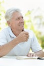 Close up portrait of man reading interesting book Royalty Free Stock Photo