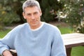 Close Up Portrait Of Man Standing Outside