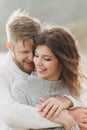 Close-up portrait of man and woman together, happy, looking at each other Royalty Free Stock Photo