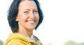 Close up portrait of mature woman weared in sports clothes in the park Royalty Free Stock Photo