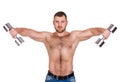 Close-up portrait of Muscular guy doing exercises with dumbbells over white background Royalty Free Stock Photo