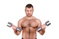 Close-up portrait of Muscular guy doing exercises with dumbbells over white background Royalty Free Stock Photo