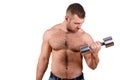 Close-up portrait of Muscular guy doing exercises with dumbbells over white background Royalty Free Stock Photo