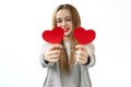 Close-up portrait of nice attractive lovely girlish cheerful girl holding in hands two heart Royalty Free Stock Photo