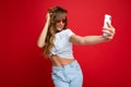 Close-up portrait nice-looking charming attractive lady making taking selfie isolated over bright vivid shine red Royalty Free Stock Photo