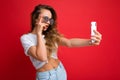 Close-up portrait nice-looking charming attractive lady making taking selfie isolated over bright vivid shine red Royalty Free Stock Photo