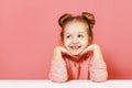 Close-up portrait of nice lovely attractive fascinating winsome cheerful little child girl with buns looking up aside Royalty Free Stock Photo