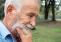 Close-up portrait of old man standing thinking, emotions and feelings Royalty Free Stock Photo
