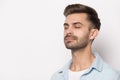 Close up portrait with peaceful handsome bearded man.