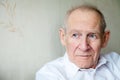 Close-up portrait of a pensive senior man