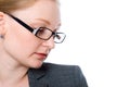 Close-up portrait of a pensive woman with glasses office