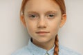 Close-up portrait of pleased caucasian girl isolated