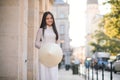 Close up portrait of pretty asian girl dressed in Ao Dai dress with vietnamese conical hat. Royalty Free Stock Photo