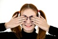 Close up portrait of pretty redhead teenage girl closing her eyes with hands Royalty Free Stock Photo