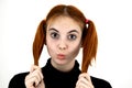 Close up portrait of pretty redhead teenage girl giving a kiss Royalty Free Stock Photo