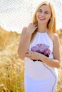 Close up portrait of pretty young blond lady under