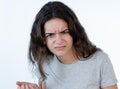 Human expressions and emotions. Portrait of young furious girl with angry face isolated on white Royalty Free Stock Photo