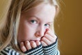 Close up portrait of a pretty young girl making eye contact with the camera Royalty Free Stock Photo