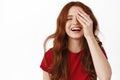 Close up portrait of real happy girl with red curly hairstyle, laughing and smiling natural, looking happy, sincere