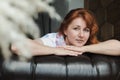 Close-up portrait of a red-haired attractive woman Royalty Free Stock Photo