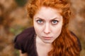 Close-up portrait of a red-haired beautiful young woman , emotions Royalty Free Stock Photo