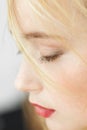 Close-up portrait of red-haired sleeping woman