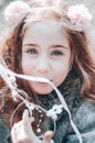 Close up portrait of a red haired smiling girl in a headband Royalty Free Stock Photo