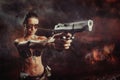 Close up portrait of riot girl with gun aiming Royalty Free Stock Photo