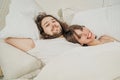 Close up portrait of romantic young couple in bed at home Royalty Free Stock Photo