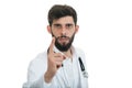 A close-up portrait of a rude, frustrated, upset doctor isolated on a white background Royalty Free Stock Photo