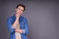 Calm young serious caucasian guy in a denim shirt Royalty Free Stock Photo