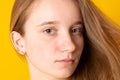 Close-up portrait of a sad girl. Studio portrait of a serious girl teenager Royalty Free Stock Photo