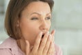 Close up portrait of sad ill young woman at home Royalty Free Stock Photo