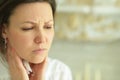 Close-up portrait of sad ill young woman at home Royalty Free Stock Photo