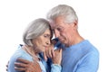 Close up portrait of sad senior couple hugging Royalty Free Stock Photo