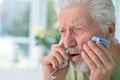 Close up portrait of sad sick senior man Royalty Free Stock Photo