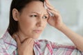 Close up portrait of sad ill young woman at home Royalty Free Stock Photo