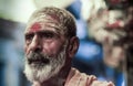 Varanasi, India: portrait of a Sadhu, Hindu ascetic or holy man, with beard and face painted Royalty Free Stock Photo