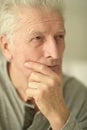 close-up portrait of a senior man thinking about something Royalty Free Stock Photo