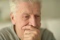 close-up portrait of a senior man thinking about something Royalty Free Stock Photo