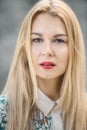 Close-up portrait of sensual blonde young woman in park. Royalty Free Stock Photo