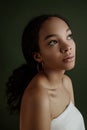 Close up portrait of sensual young female. Clean skin. Healthy care. Portrait of beautiful african american in hat Royalty Free Stock Photo