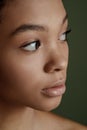 Close up portrait of sensual young female. Clean skin. Healthy care. Portrait of beautiful african american in hat Royalty Free Stock Photo