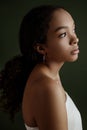 Close up portrait of sensual young female. Clean skin. Healthy care. Portrait of beautiful african american in hat Royalty Free Stock Photo