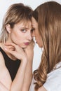 Close-up portrait of sensual young lesbian couple posing together Royalty Free Stock Photo