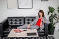 Close up portrait of a serious business woman in gray suit standing in the city Royalty Free Stock Photo