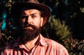 Close up portrait of serious man in cowboy hat. Royalty Free Stock Photo