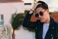 Close-up portrait of a serious young man posing outdoors Royalty Free Stock Photo