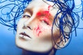 Close up portrait of sexual woman with body art and neon powder Royalty Free Stock Photo